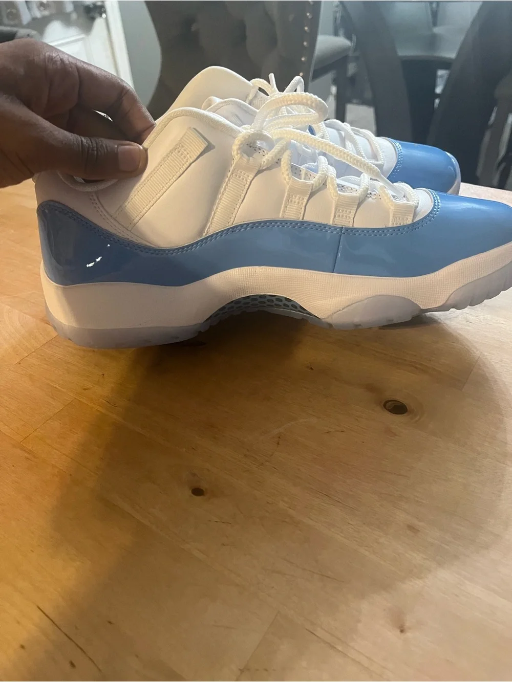 UNC Jordan 11 Low-Top Sneakers in White and Light Blue Patent